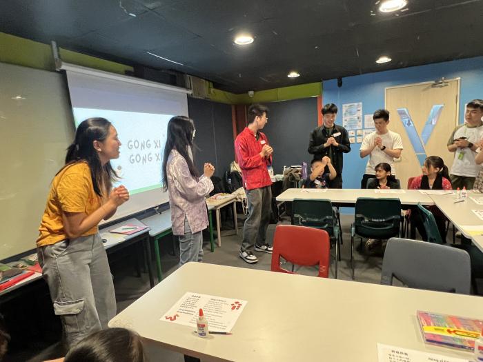The Next Changemakers teaching the "Gongxi Gongxi" song.