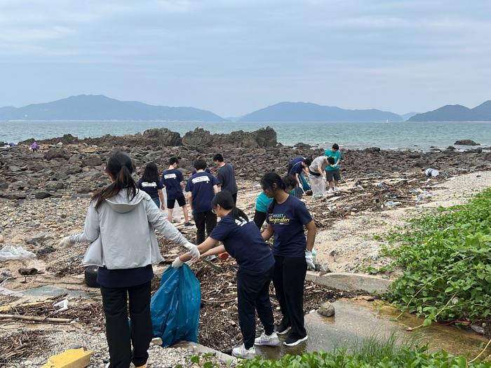 Collecting trash with groupmates