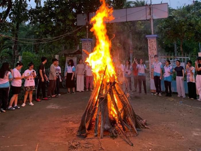 Having campfire with the local youth