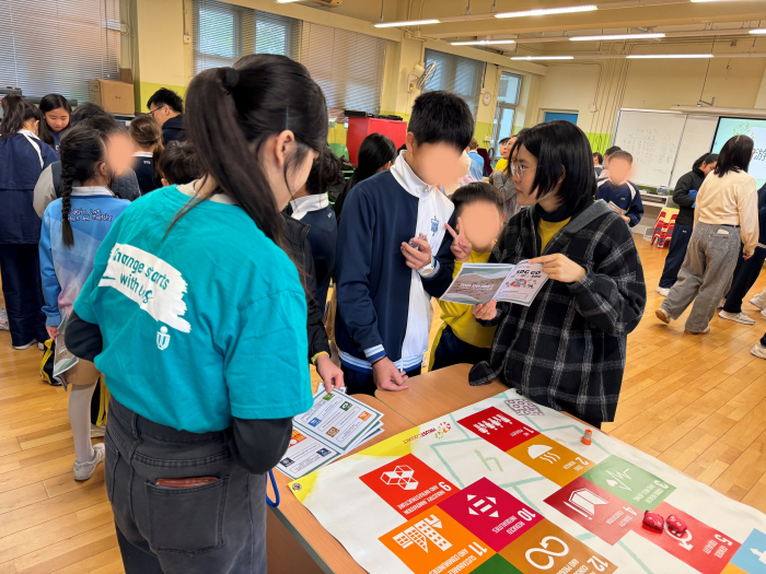 Primary school students enjoying SDG-related games