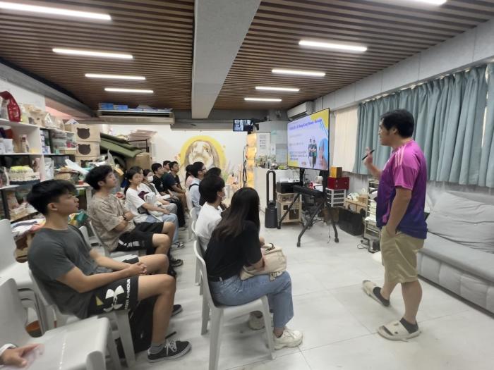 Students learning about the work of HKBR