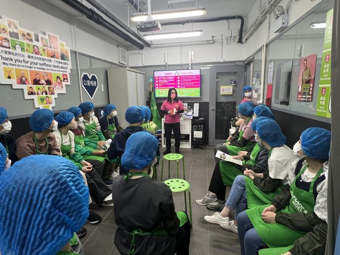 Volunteers gearing up for meal packaging