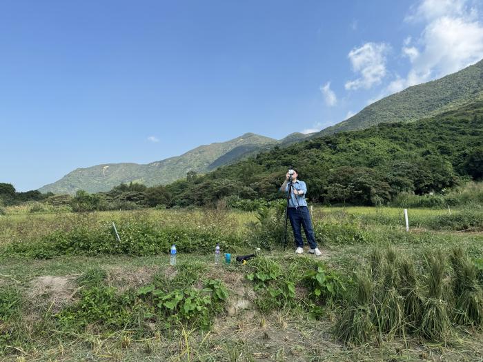 Students filming highlights of the "Rice Harvesting Experience"