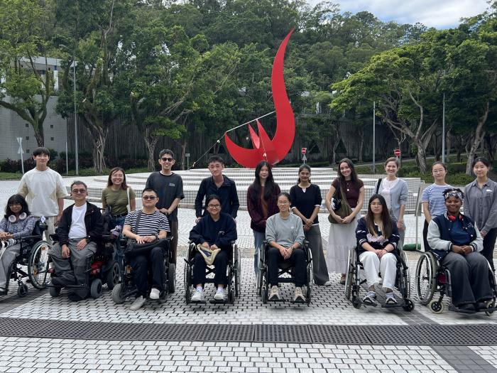 Students interacting with wheelchair users