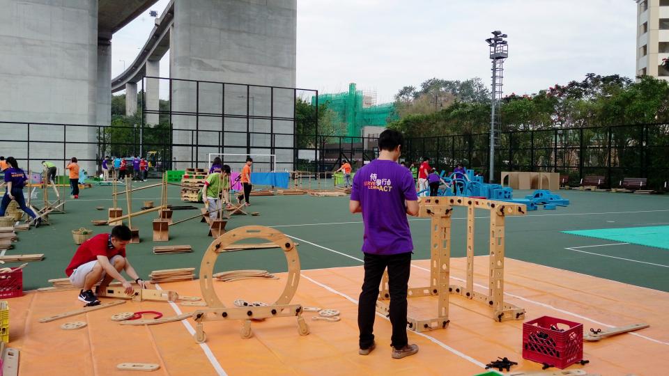 Volunteers setting up the game venue for the children