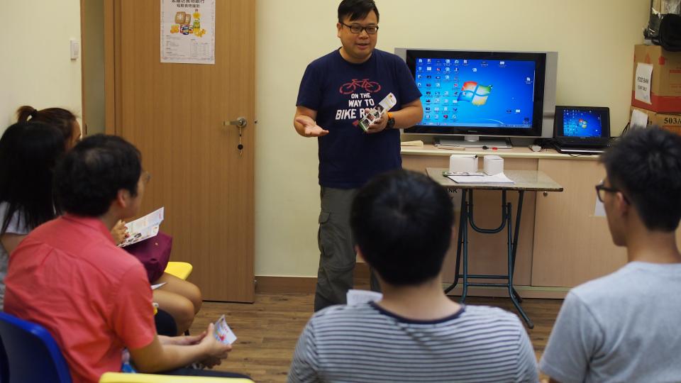 Volunteers being briefed by the social worker from the center