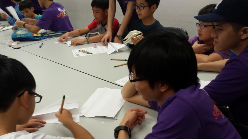 Volunteer drawing with children