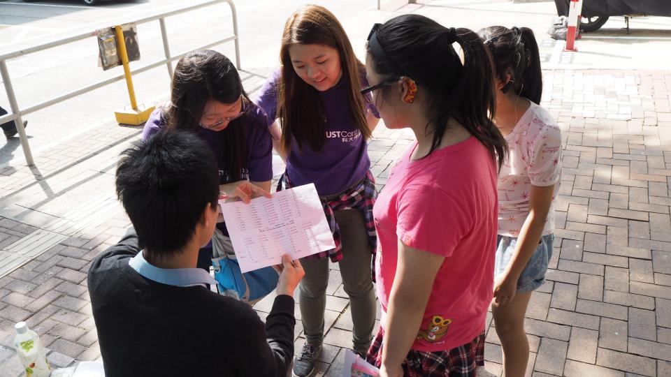 Volunteers and the service recipients playing a check point game together