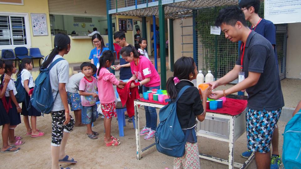 Volunteers assisting in food program in CCF