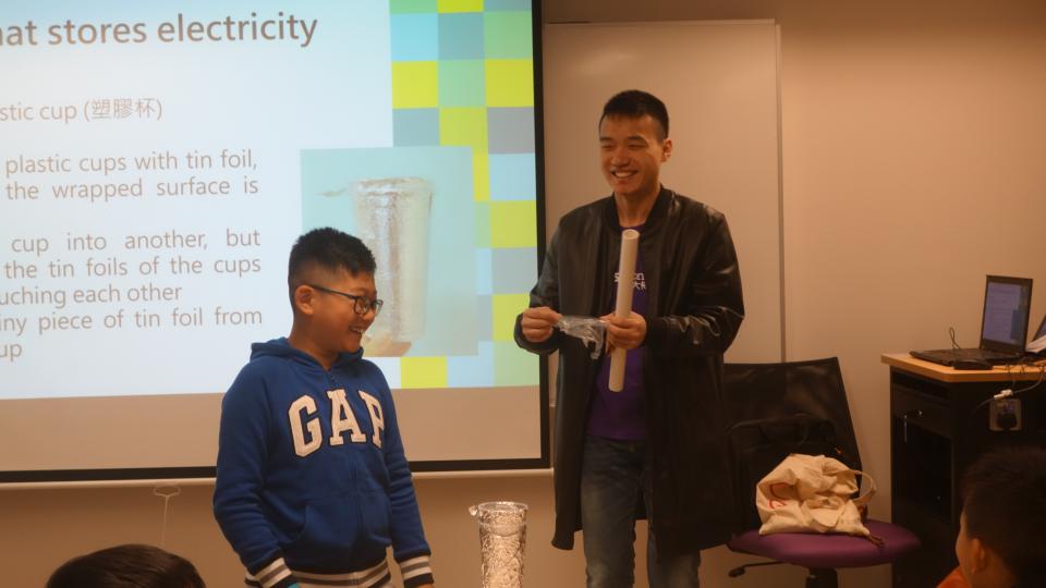 Volunteers teaching the children