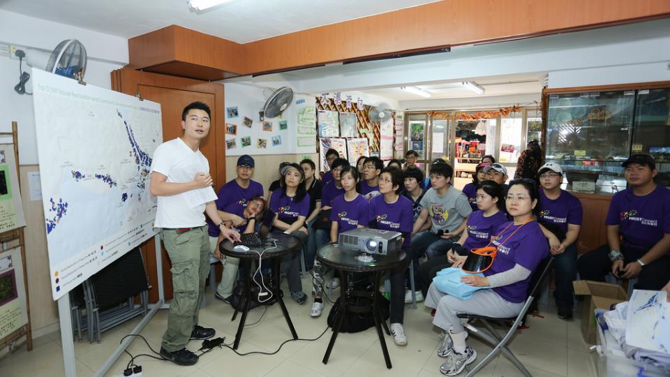 Volunteers having a briefing