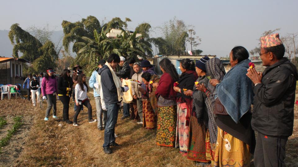 A warm welcome by the local villagers