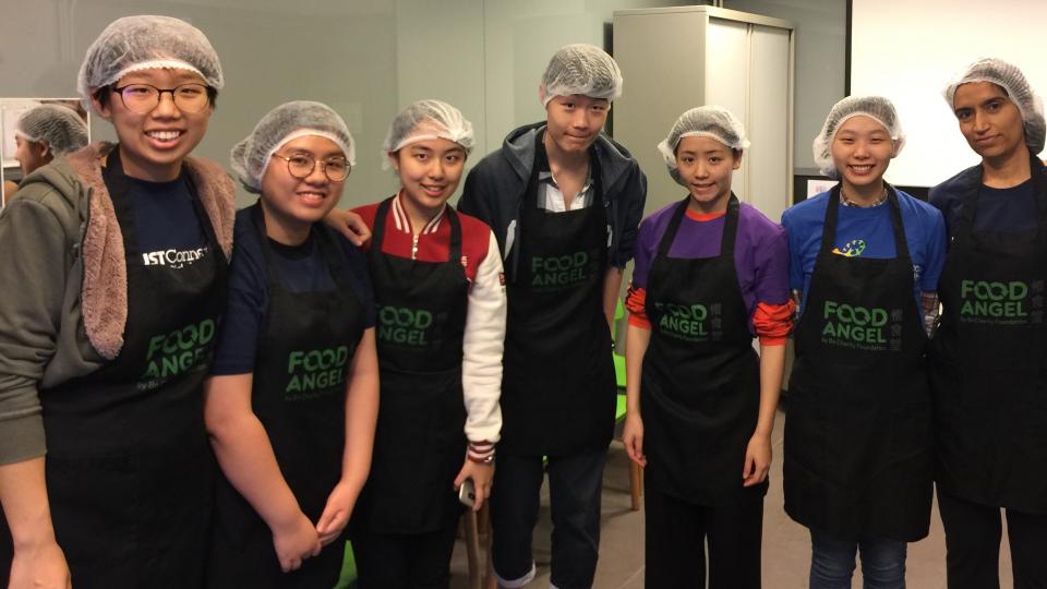 Volunteers helped prepare meal boxes at Food Angel kitchen