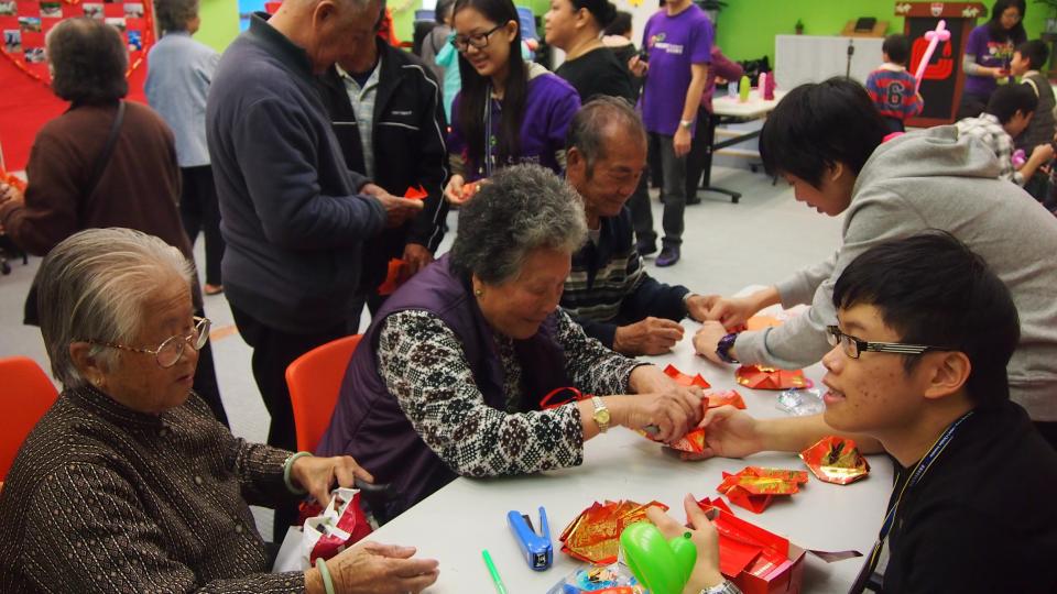The elders enjoying handicrafts and other game booths prepared by our students
