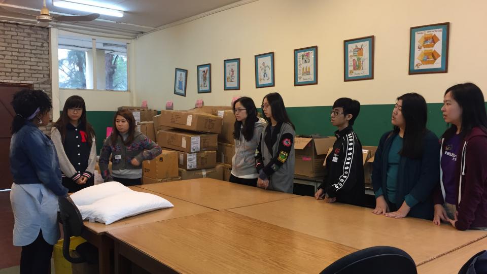 Volunteers listening to instructions