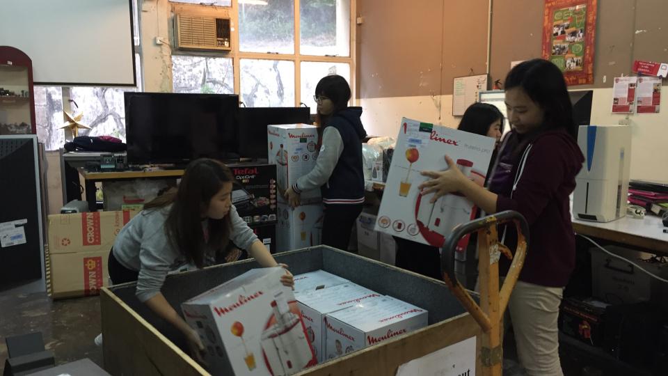 Volunteers helping to distribute goods