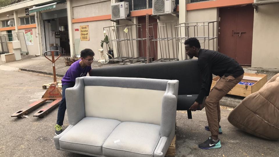 Volunteers helping with the repairing work
