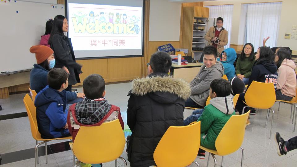 Volunteers interacting with the children