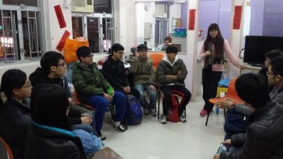 The social worker introducing the background of Shum Shui Po