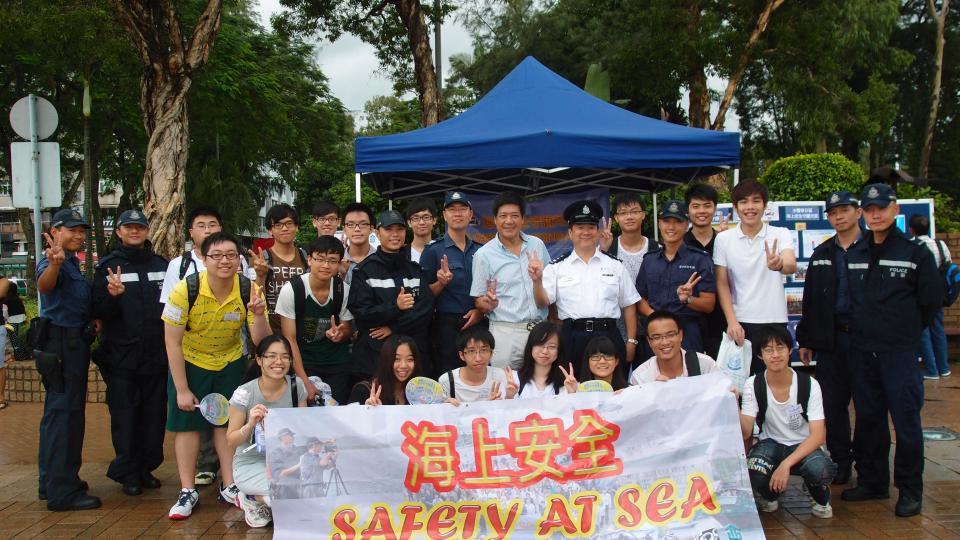 A group photo with community leaders and police officers