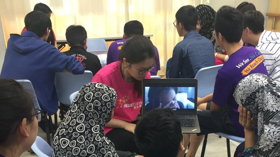 Volunteers introducing the video clip to the service recipients