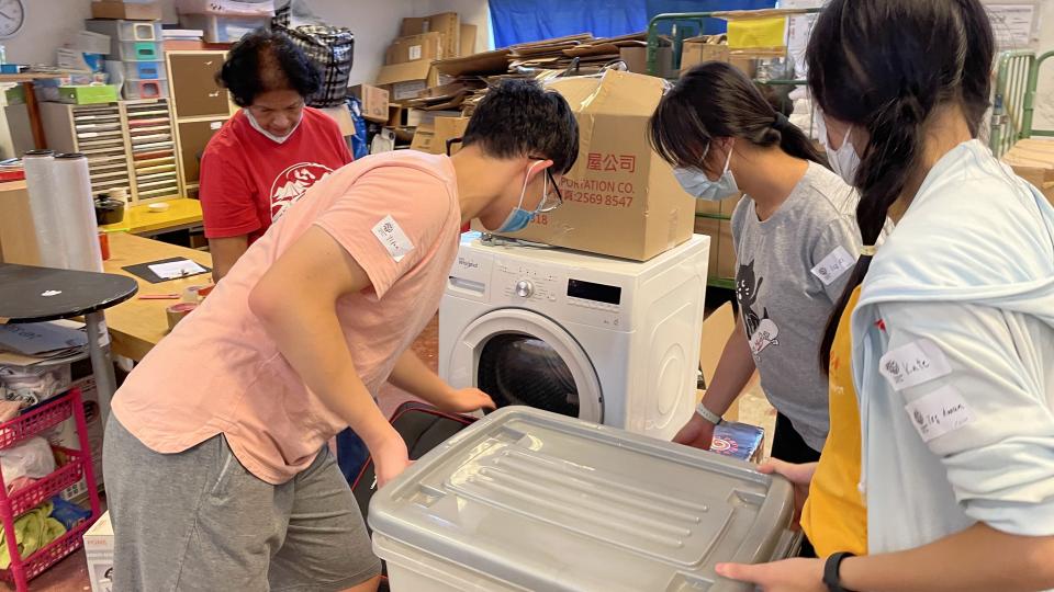 Volunteers working with Crossroads Foundation