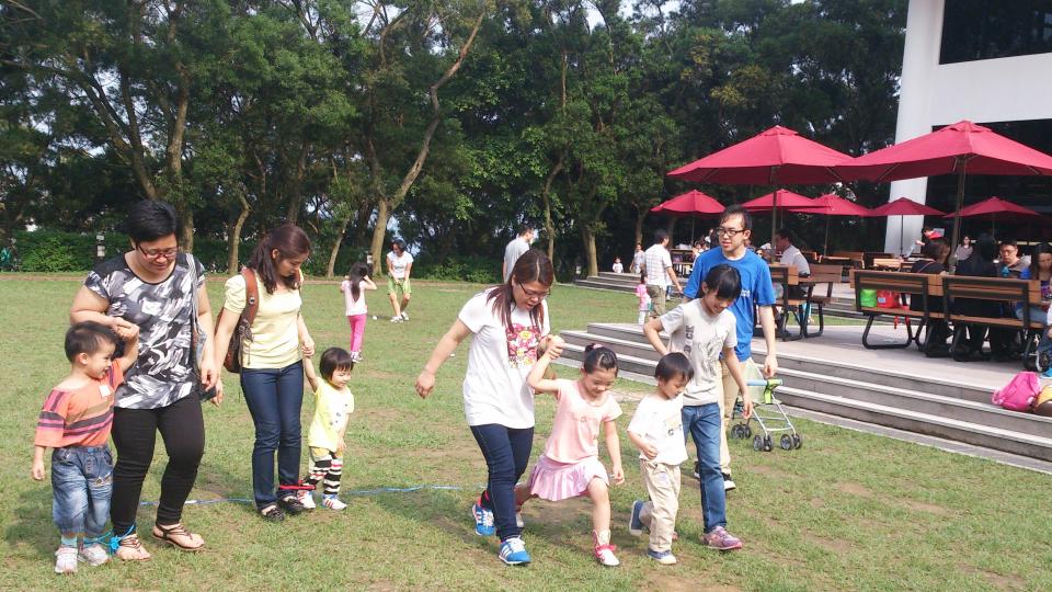 Children playing games with their parents in HKUST Campus