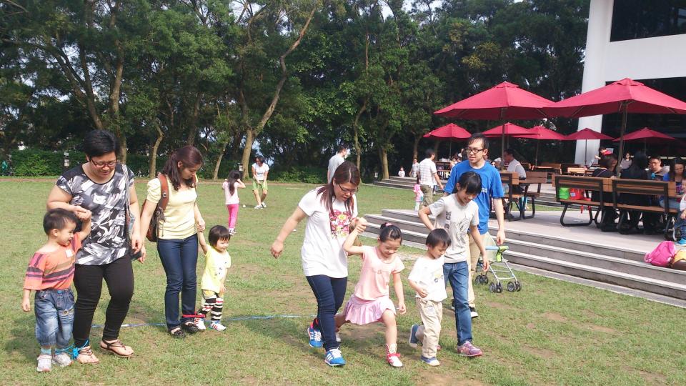Children playing games with their parents in HKUST Campus