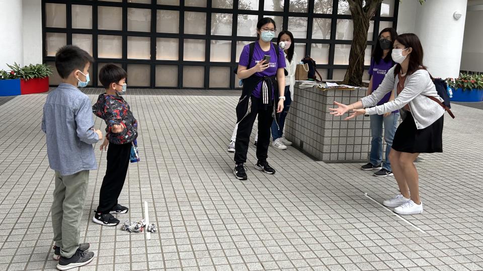 Volunteers leading a checkpoint game