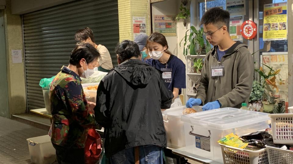 Volunteers redistributing food