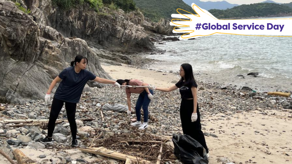 students cleaning the beach