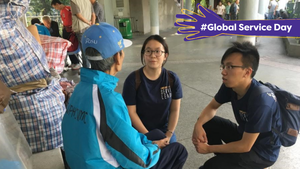 Volunteers talking to a street sleeper