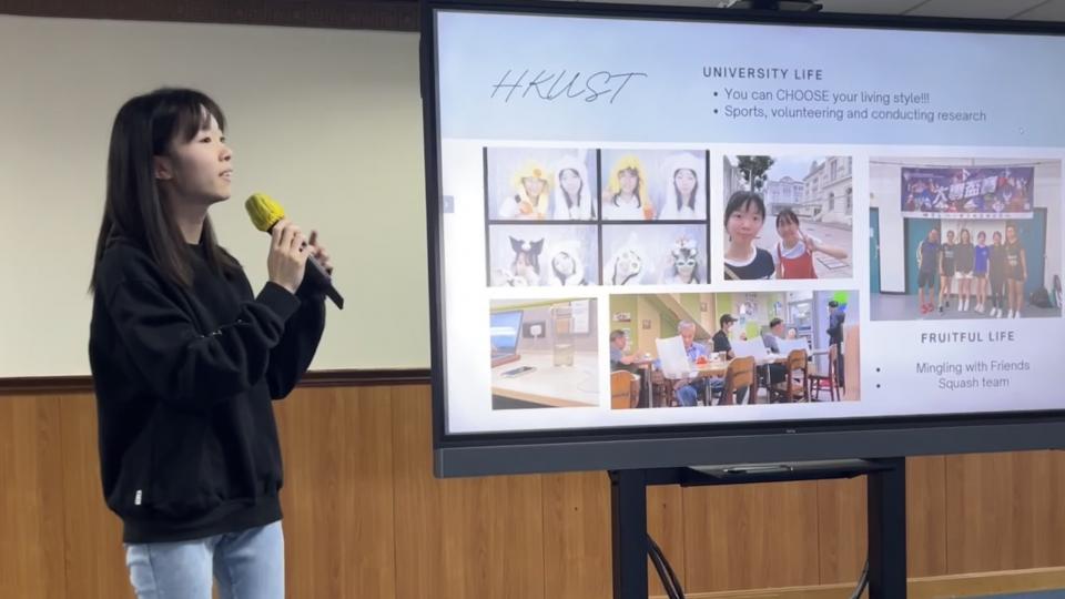 Volunteer sharing their university life with the secondary school students