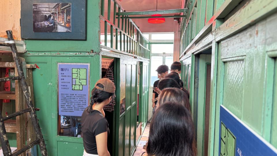 Students exploring the cage home area