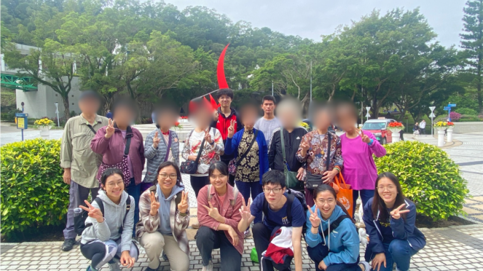 Group photo of volunteers and elderly