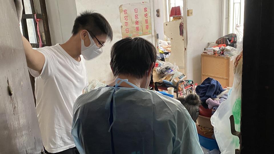 Volunteer helping a person with Hoarding Behaviours