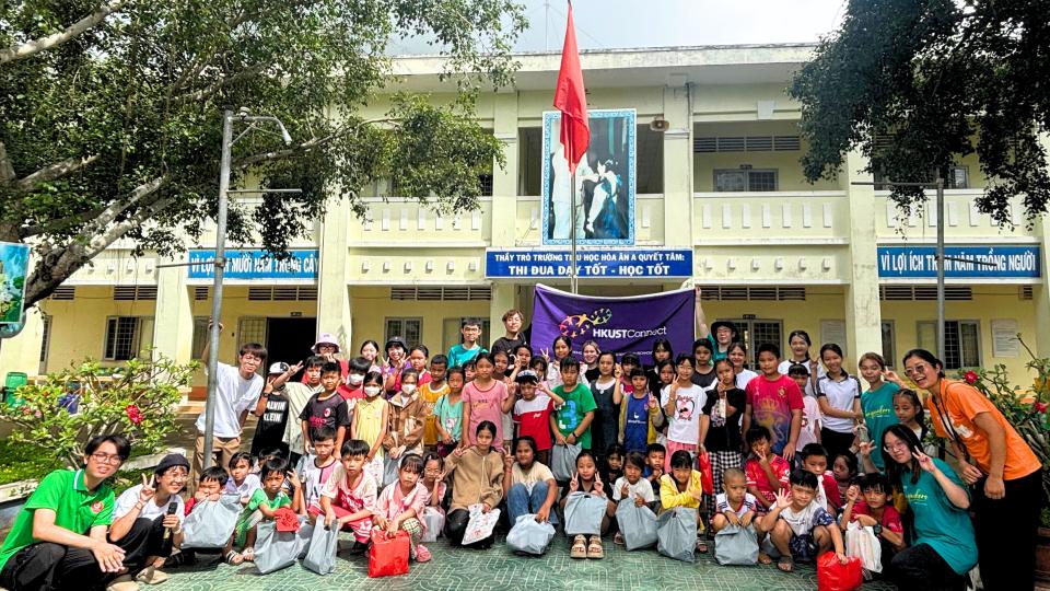 Group photo taken at a local school on Carnival Day