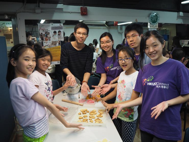 Connect ACE baking cookies with the children