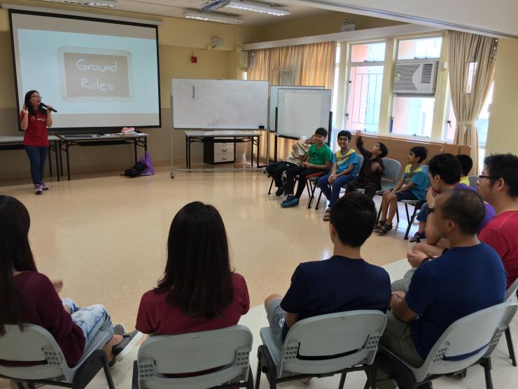 Student leaders presenting the skills to children