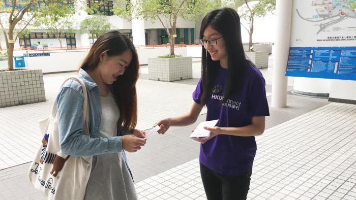 Volunteers approaching fellow students for the promotion