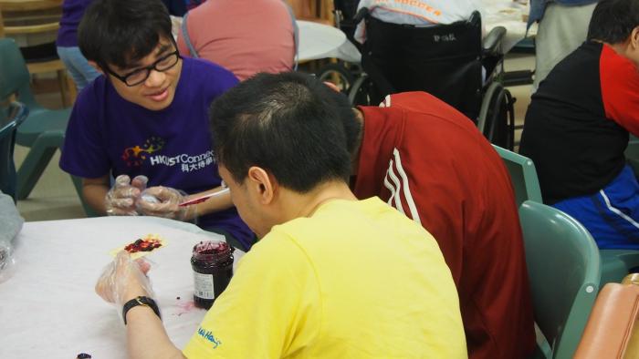 Volunteers visiting the training centre for intellectually challenged adults