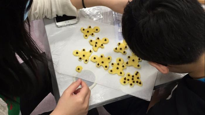 Making cookies with visually impaired children