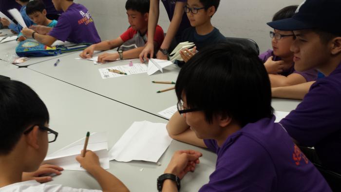 Volunteer drawing with children