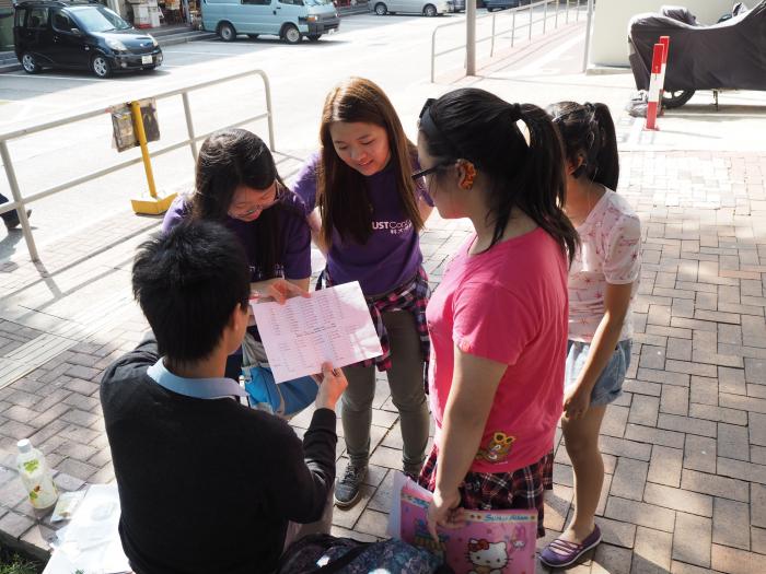 Volunteers and the service recipients playing a check point game together