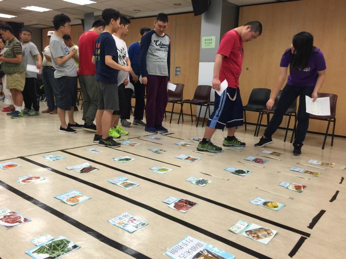 Volunteers and service recipients playing games