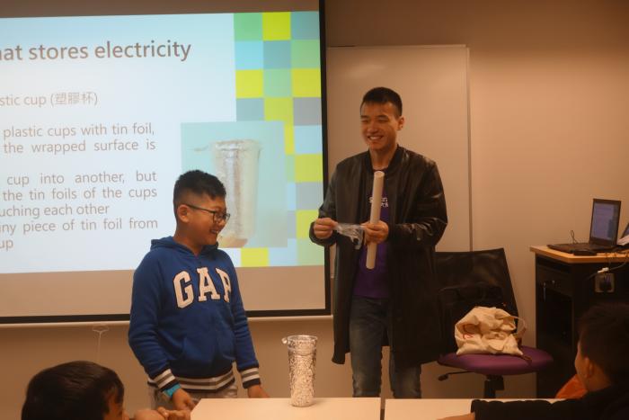 Volunteers teaching the children