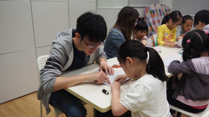 Volunteers interacting with the children