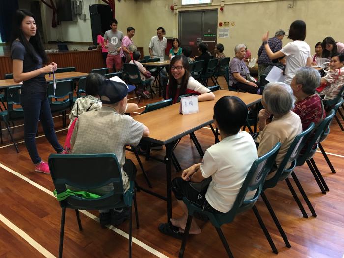 The elders chatting with our student volunteer	