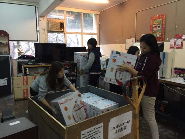 Volunteers helping to distribute goods