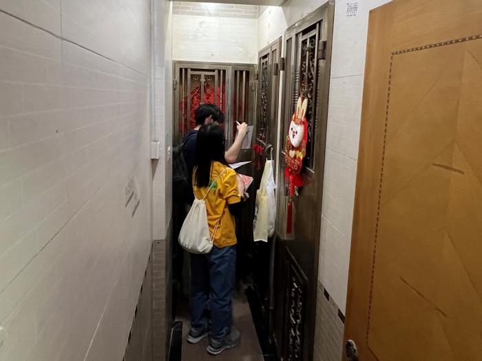 Students conducting door-to-door visits